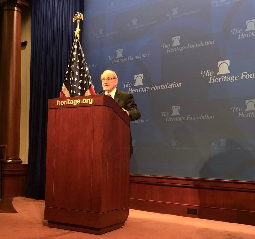 Risch on the podium at Heritage Foundation event